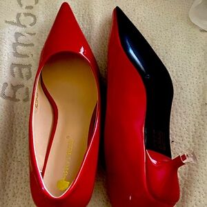 Red dress shoes brand new never worn.
